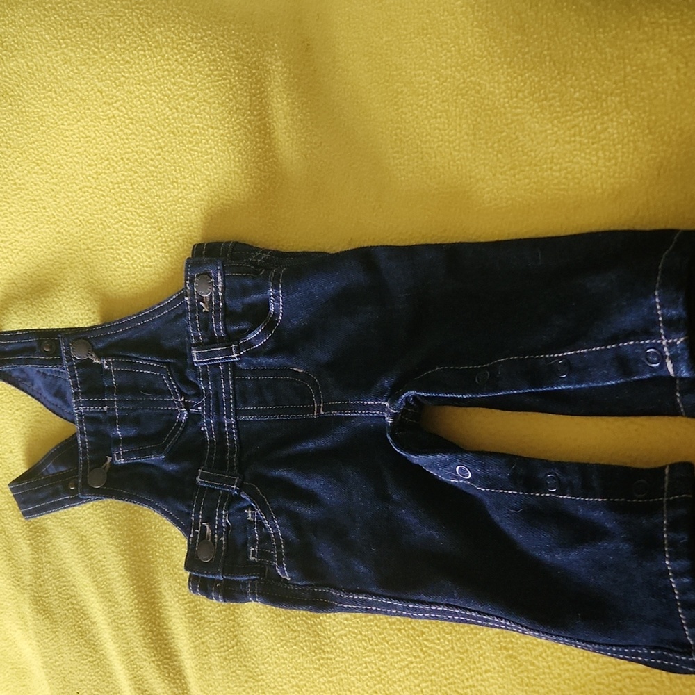 O12 Heavy duty kids denim overalls. Leg snaps for easy diaper change. 4 pockets